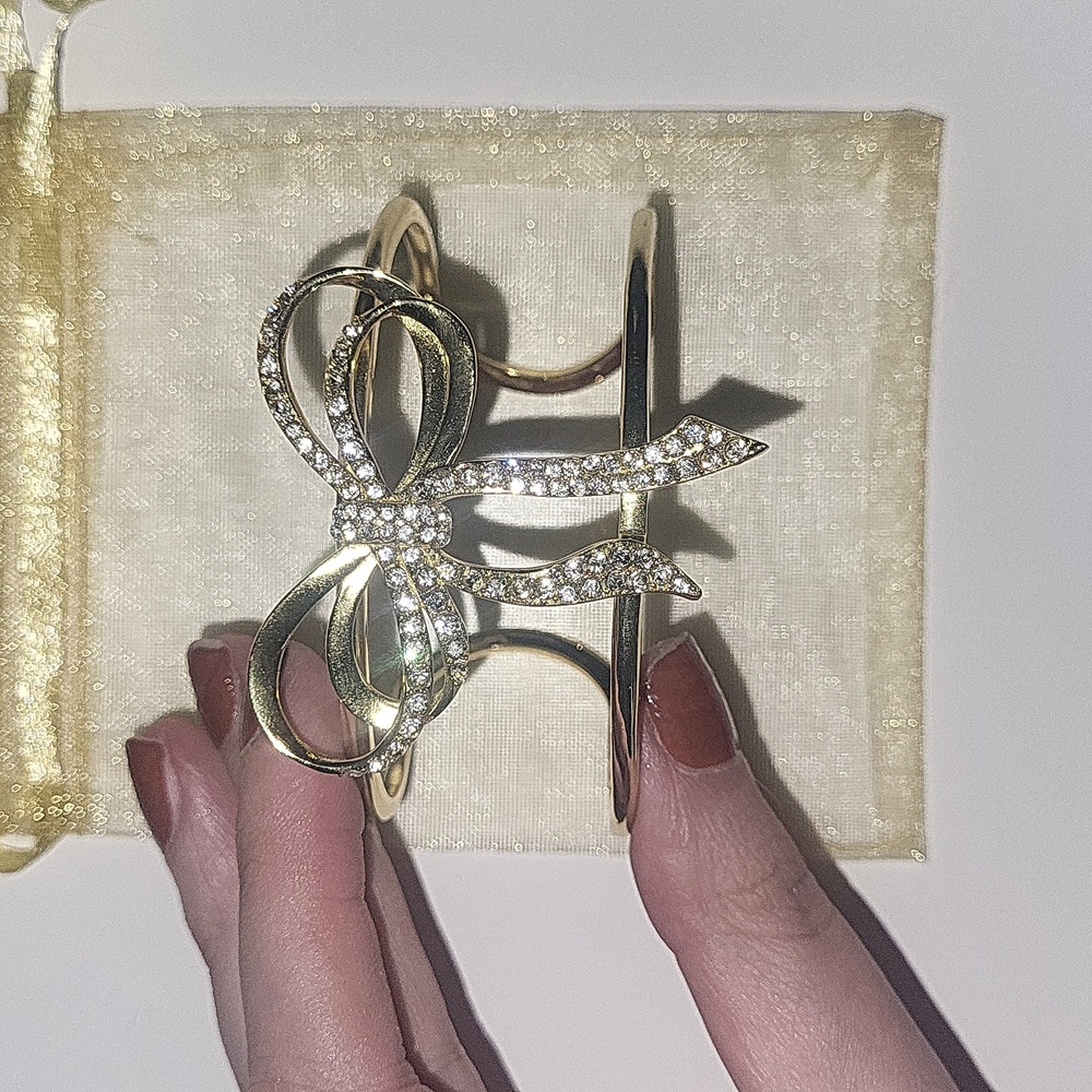 NWT Vince Camuto gold bow open bangle bracelet,  clear rinestones